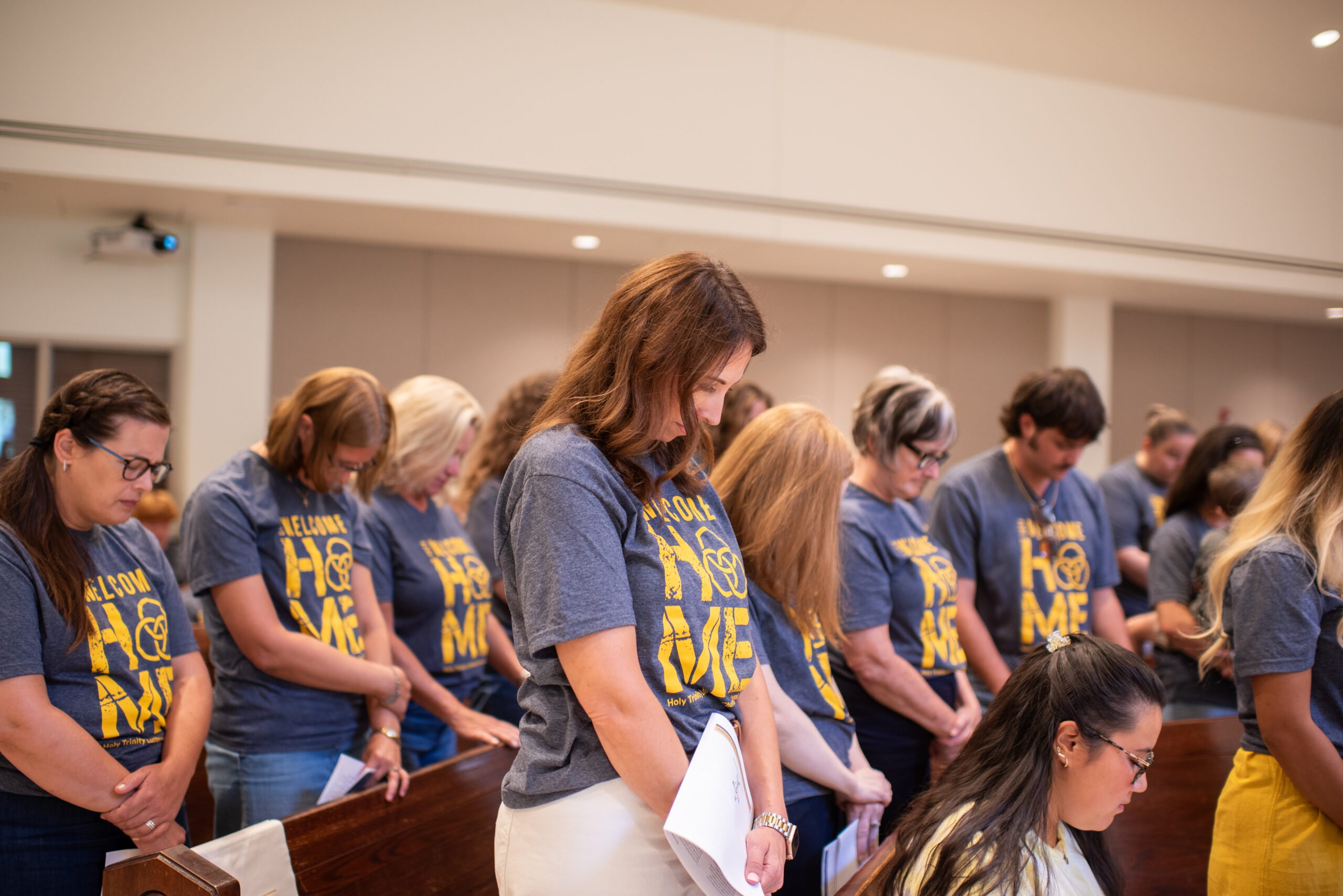 DSC_1588 people sitting on chair in front of table while holding pens during daytime